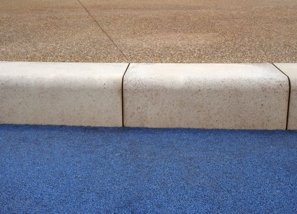 Curb And Sidewalk Installation in Brick