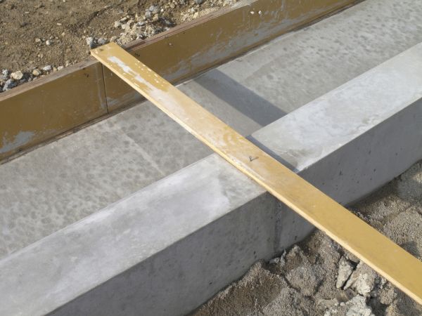 Cement Footing Installation in Brick