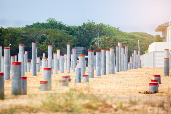 Concrete Pile Installation in Brick