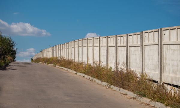 Cement Fence Installation in Brick