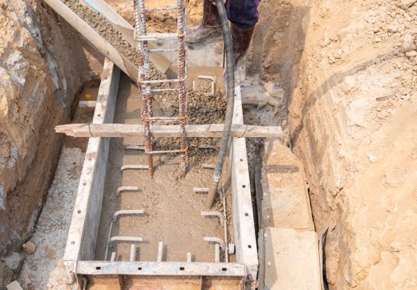 Cement Foundation Pouring in Brick