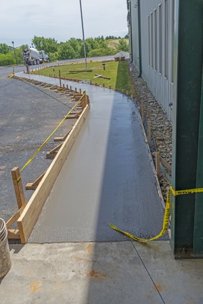 Concrete Sidewalk Paving in Brick