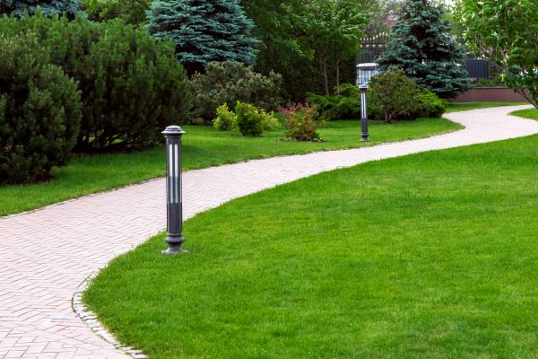 Backyard Sidewalk Installation in Brick