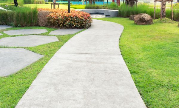 Concrete Sidewalk Installation in Brick